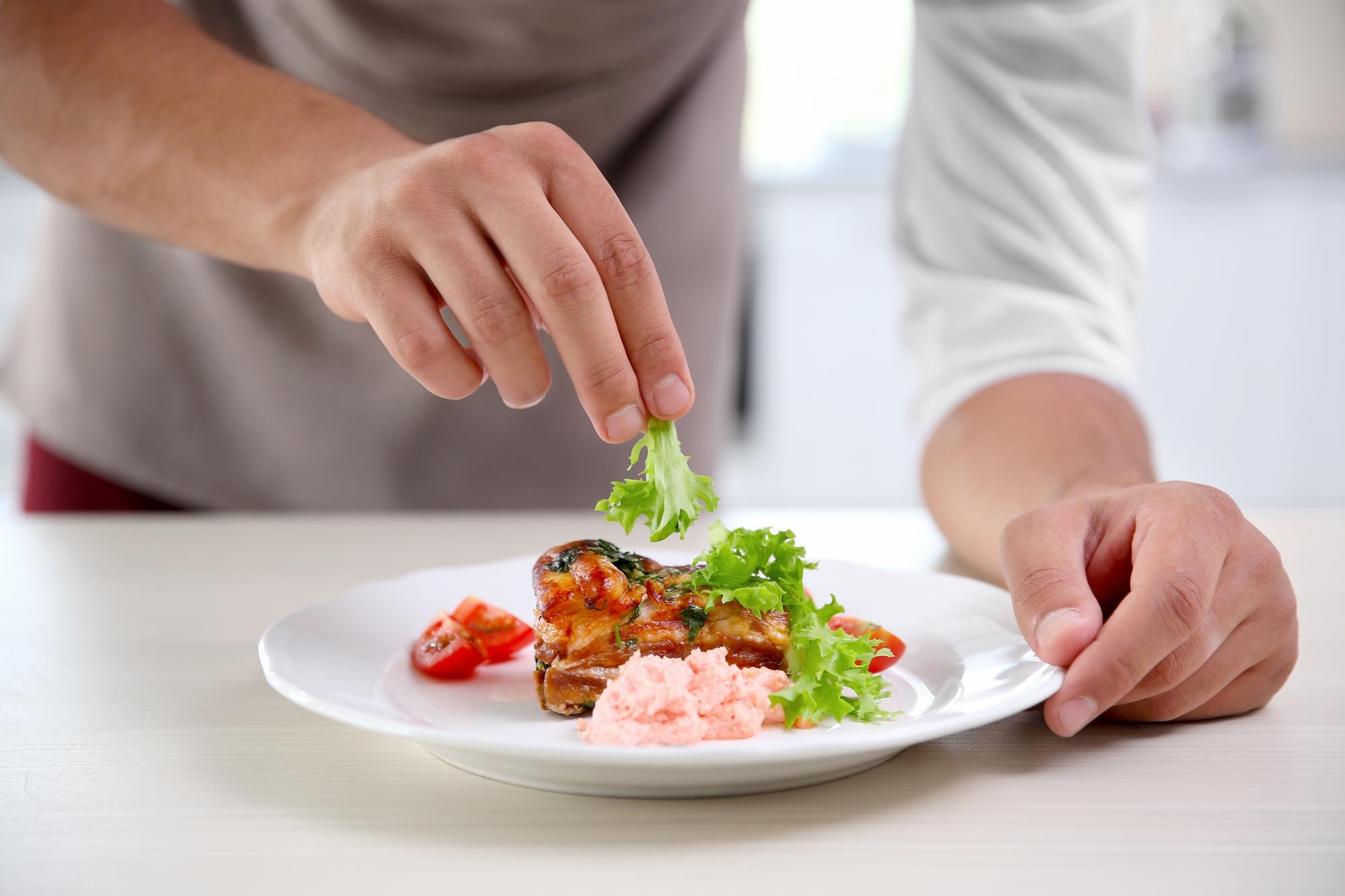 Chef plating a quick weekday dinner