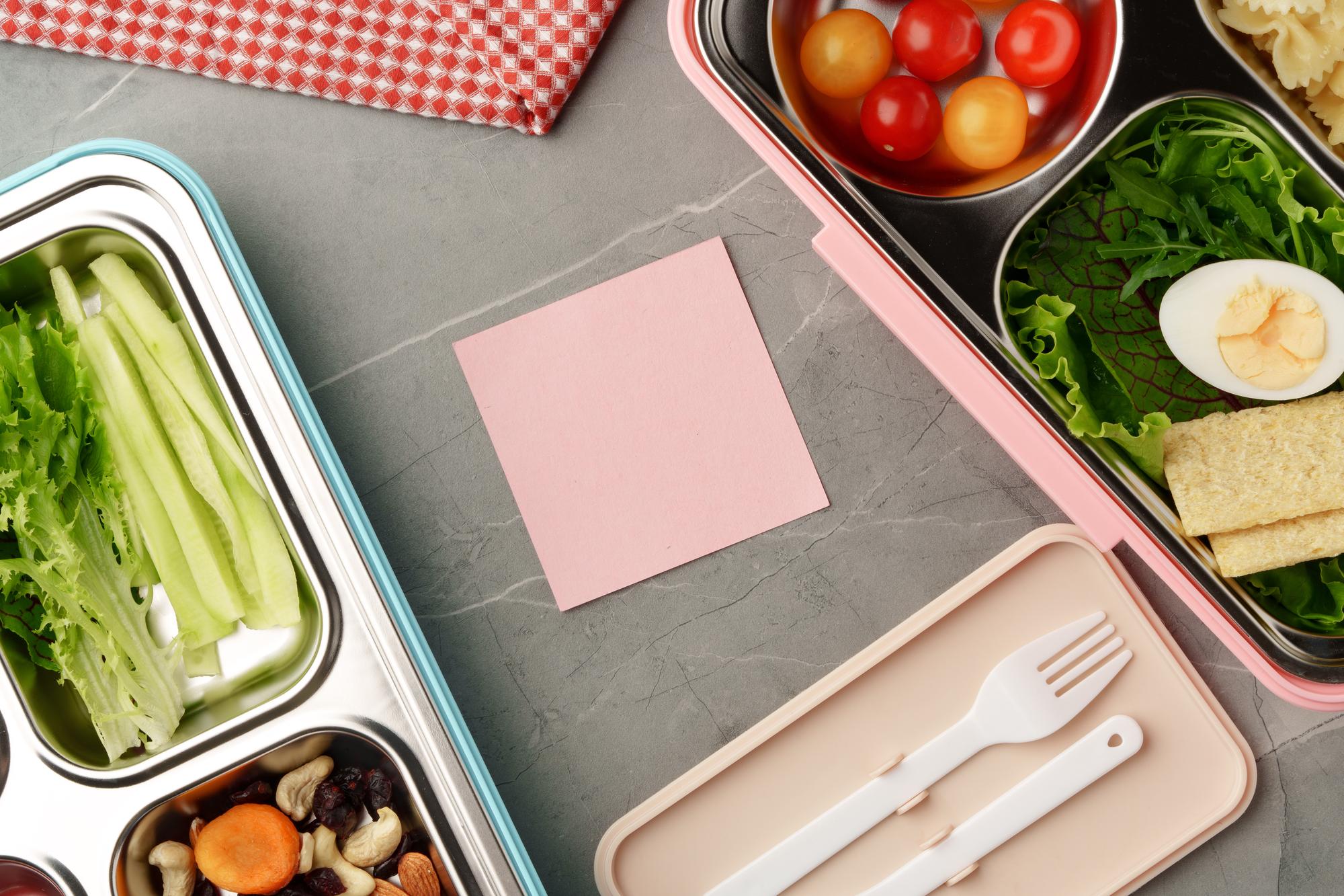 Flat lay of packaged meal kits and recipe cards